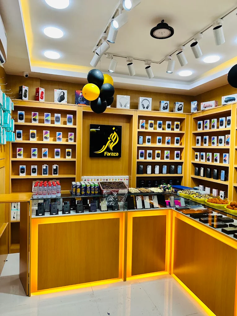 Faraza Mobile showroom interior with display shelves of smartphones and accessories